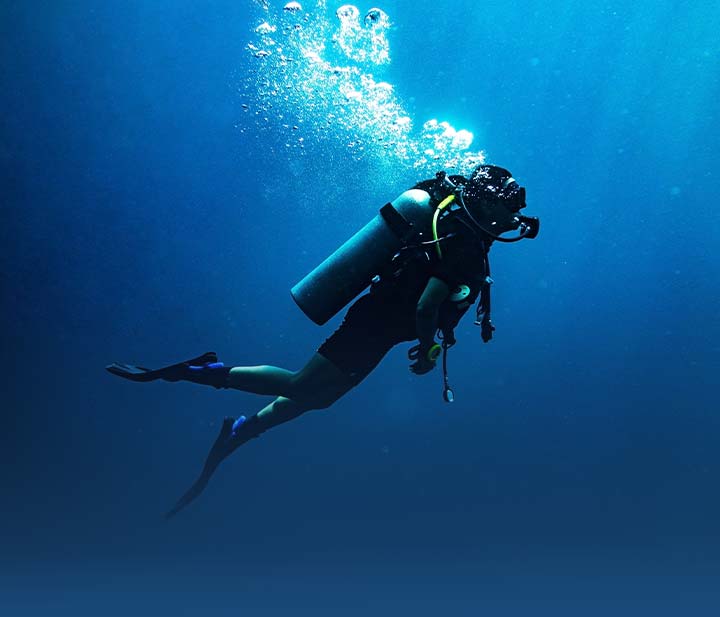 Scuba Diver hanging out in the blue